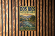 A vintage metal sign for Dos Rios State Park in California, featuring a scenic image of a river and mountains.