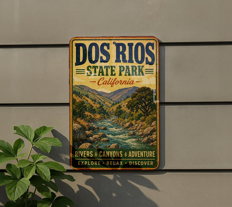 a vintage-style metal sign for the state park, with a scenic illustration of a river and mountains.