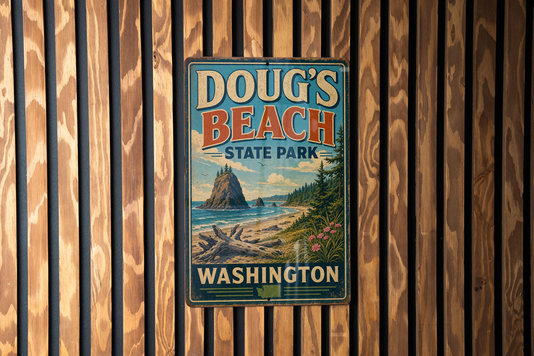 A vintage metal sign for Doug's Beach State Park in Washington, featuring a scenic landscape with a mountain, beach, and pine trees.