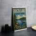 A metal sign for Duck Lake State Park in Michigan, featuring a scenic illustration of a lake with a loon and trees in the background.
