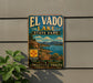 A vintage metal sign for El Vado Lake State Park, featuring a scenic landscape with mountains, a lake, and a boat.