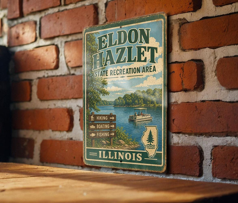 A vintage metal sign for the El donkey Hazellet State Recreation Area in Illinois, featuring a scenic image of a lake and surrounding landscape.