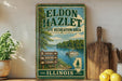A vintage-style sign for the Eldon Hazlet State Recreation Area in Illinois, featuring a scenic image of a lake and surrounding nature.