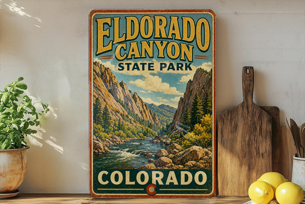 A vintage-style poster of Eldorado Canyon, a state park in Colorado, is displayed on a wall next to a wooden cutting board and some kitchen utensils.
