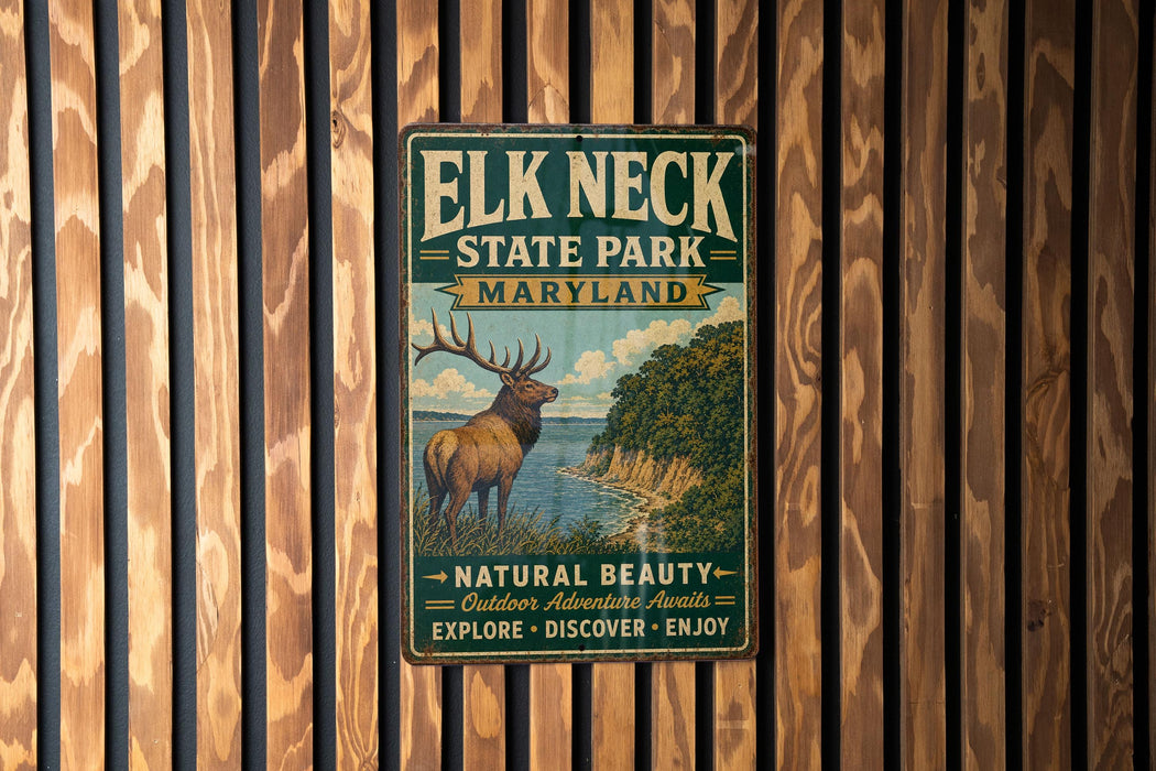 A vintage metal sign for Elk Neck State Park, Maryland, featuring an illustration of a deer in a wooded area with a body of water in the background.