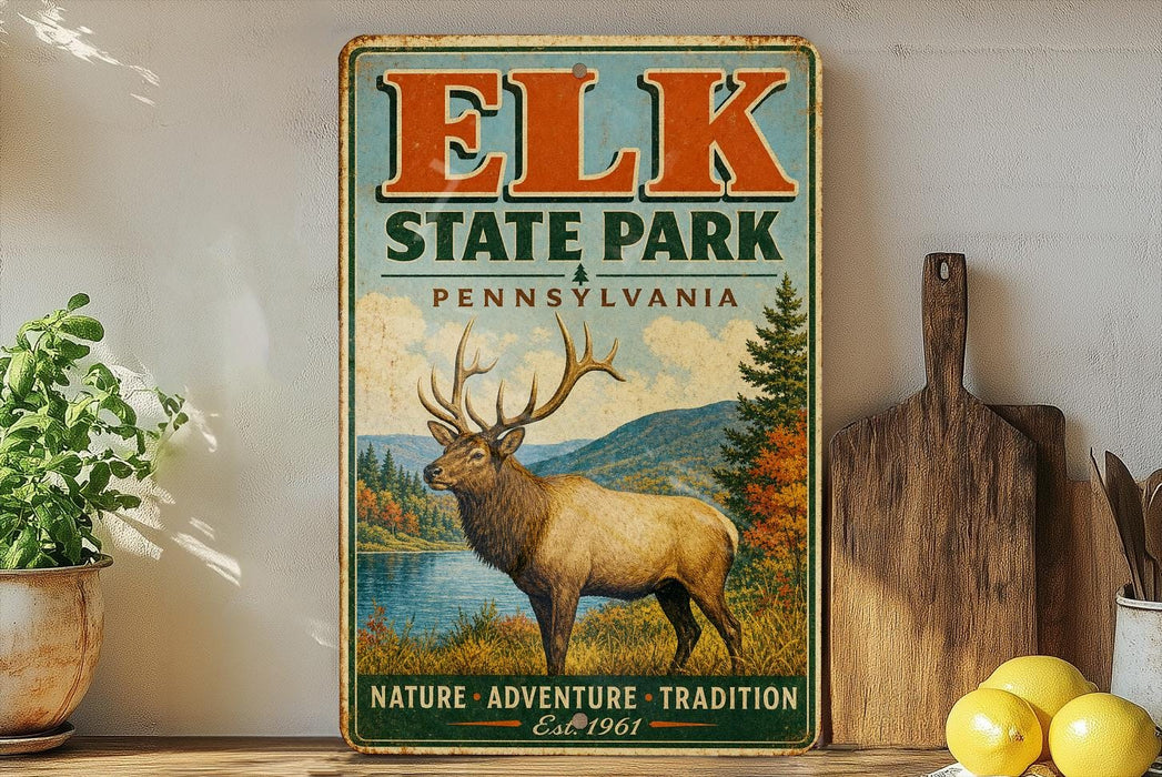 A vintage-style metal sign for Elk State Park in Pennsylvania, featuring an illustration of a deer in a scenic landscape.