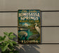 A metal sign for Homosassa Springs Wildlife State Park in Florida, featuring a manatee and a white egret in a tropical setting.