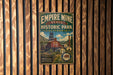 A vintage-style metal sign for Empire Mine State Historic Park in California, featuring a scenic illustration of the historic site.