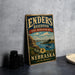A vintage-style sign for the Enders Reservoir in Nebraska, featuring a scenic landscape with a lake, mountains, and a boat.