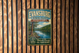 A vintage-style metal sign for Evansburg State Park in Pennsylvania, featuring a scenic image of a river and forest.