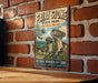 A vintage-style metal sign for Fairy Stone State Park in Virginia, featuring a scenic illustration of the park's unique rock formations.