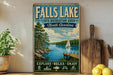 A vintage-style sign for Falls Lake State Recreation Area in North Carolina, featuring a scenic illustration of a lake, dock, and sailboat.