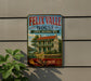 A vintage-style metal sign for the Felix Valle House State Historic Site in Missouri, featuring an illustration of a two-story house with a red roof and surrounded by trees.