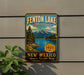 A vintage-style metal sign for Fenton Lake State Park in New Mexico, featuring a scenic mountain landscape and a lake.