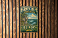 A vintage metal sign for Fernie Clyffe State Park in Illinois, featuring a scenic landscape with a river and mountains.