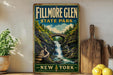 A vintage-style sign for Fillmore Glen State Park in New York, featuring a scenic illustration of a waterfall and a bridge.
