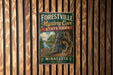 A vintage-style metal sign for the Forestville Mystery Cave State Park in Minnesota, featuring a scenic illustration of the cave and surrounding landscape.