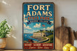 A vintage-style sign for Fort Adams State Park in Rhode Island, featuring a castle, boats, and a blue sky with clouds.