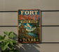A vintage-style metal sign for Fort Boggby State Park in Texas, featuring a scenic landscape with a river, palm trees, and a sign indicating the park's location.
