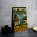 A vintage-style sign for the Fort Custer Recreation Area in South West Michigan, featuring a scenic beach and a wooden lookout tower.