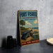 A vintage-style sign for the Fort Fisher State Recreation Area in North Carolina, featuring a cannon and a beach scene.