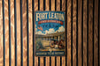 A vintage-style metal sign for Fort Leaton, a historic site in Texas, featuring an image of a cannon and a building with a Texas flag.