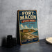 A vintage-style metal sign for Fort Macon State Park in North Carolina, featuring an illustration of the fort and beach.