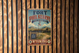 A vintage-style metal sign for Fort Phil Kearny, the State Historic Site in Wyoming, featuring a scenic image of the historic site and the text "Our History - Our Heritage".