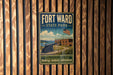 A vintage-style metal sign for Fort William State Park, featuring an illustration of the fort and surrounding landscape, mounted on a wooden wall.