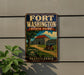 A vintage-style metal sign for Fort Washington State Park in Pennsylvania, featuring a castle and a cannon, mounted on a wall.