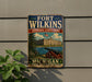 A vintage-style sign for Fort Wilkins Historic State Park in Michigan, featuring an illustration of a cannon and a building.