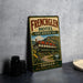 A vintage metal sign for the French Glen Hotel, featuring an illustration of the hotel building and a scenic mountain backdrop.