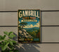 A vintage metal sign for Gambrill State Park, Maryland, featuring a scenic mountain landscape with a pine tree and rocky outcropping.