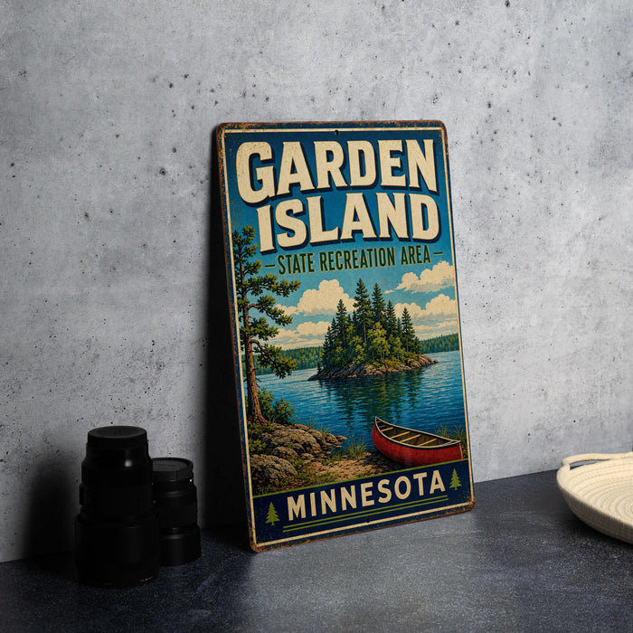 A vintage-style sign for Garden Island, Minnesota, featuring a scenic illustration of a lake, island, and canoe.