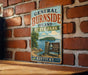 A vintage metal sign for General Burnside Island State Park in Kentucky, featuring a scenic illustration of the island and its surrounding landscape.