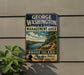 A vintage metal sign for the George Washington Management Area in Rhode Island, featuring a scenic landscape with a river and mountains.