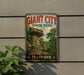 A vintage-style sign for Giant City State Park in Illinois, featuring a scenic landscape with a large rock formation and trees.