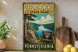 A vintage-style sign for Gifford Pinchot State Park in Pennsylvania, featuring a scenic landscape with a river and mountains.