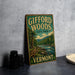 A vintage-style metal sign for Gifford Woods State Park in Vermont, featuring a scenic illustration of a forest and a river.