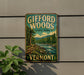 A vintage-style sign for Gifford Woods State Park in Vermont, featuring a scenic landscape with a river and forest.