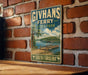 A vintage-style sign for Givhans Ferry, a historic ferry service in South Carolina, is displayed on a brick wall.