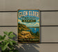 A vintage-style metal sign for Glen Elder State Park in Kansas, featuring a scenic landscape with a lake, mountains, and a sailboat.