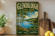 A vintage-style poster advertising Glendalough State Park in Minnesota, featuring a scenic landscape with a lake, trees, and mountains.