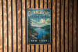 A vintage-style metal sign for Glimmerglass State Park in New York, featuring a scenic landscape with a lake, mountains, and a sailboat.