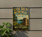 A vintage-style sign for Golden Memorial State Park in Mississippi, featuring a scenic landscape with a lake, trees, and a monument.