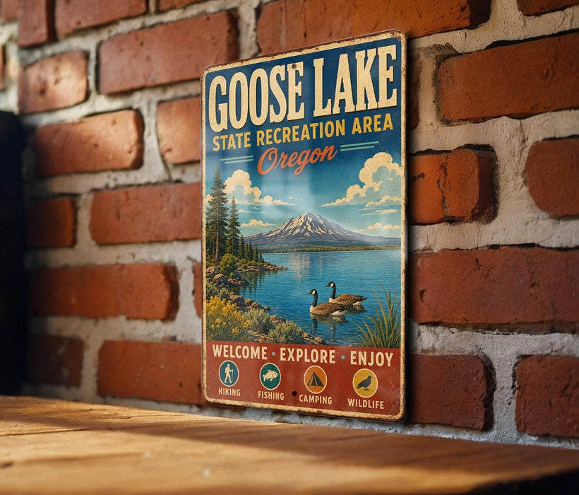A vintage metal sign for Goose Lake State Recreation Area in Oregon, featuring a scenic landscape with a mountain, lake, and ducks.