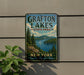 A vintage-style metal sign for Grafton Lakes State Park, featuring a scenic landscape with pine trees, a lake, and mountains in the background.