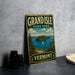 A vintage-style sign for Grand Isle State Park in Vermont, featuring a scenic image of the island and its surroundings.
