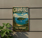 A vintage-style sign for Grand Isle State Park in Vermont, featuring a scenic image of the island and its surrounding waters.