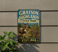 A vintage-style metal sign for Grayson Highlands State Park in Virginia, featuring a donkey and a scenic landscape.